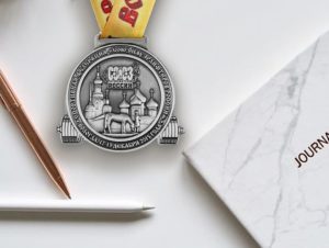 Custom silver medal with yellow ribbon