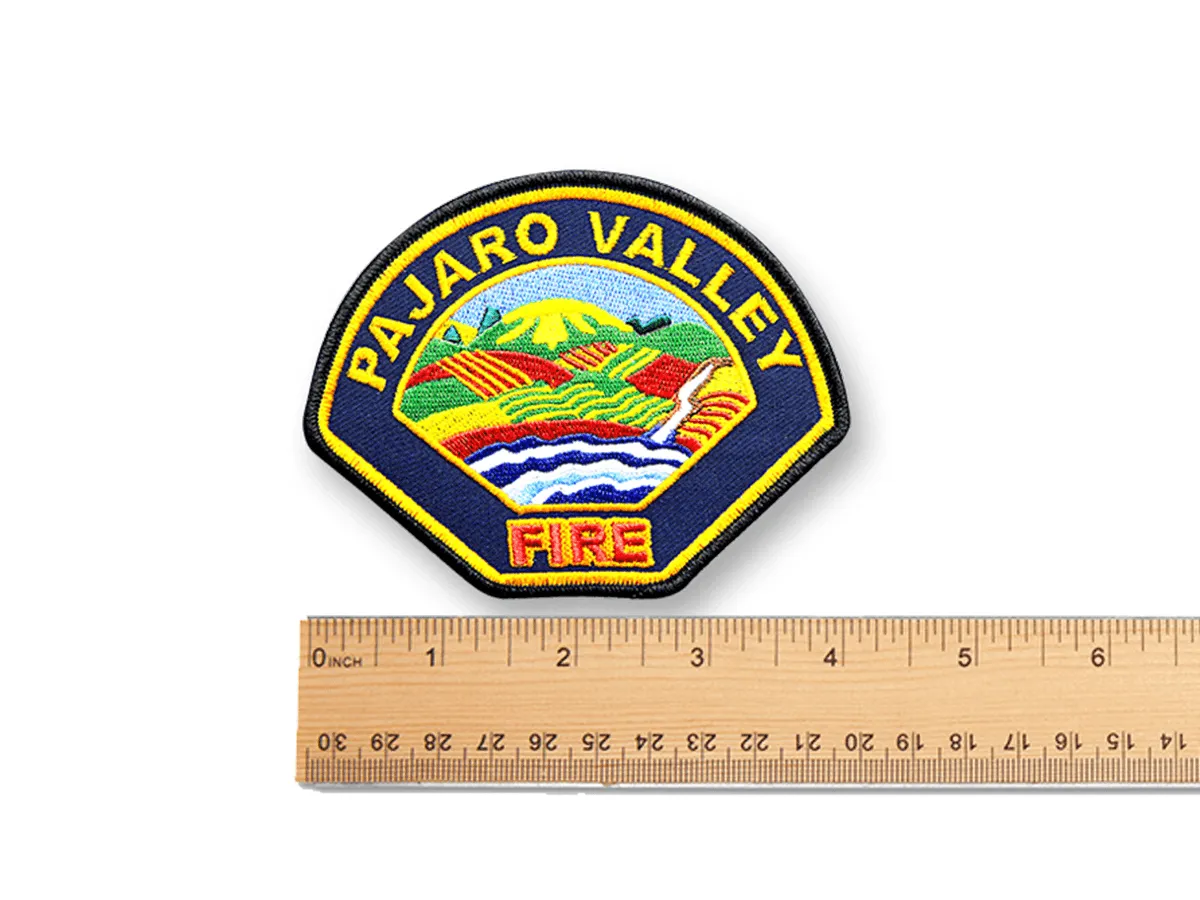 Custom fire department patch next to a ruler