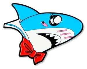 Lapel pin of a shark wearing a red bow tie