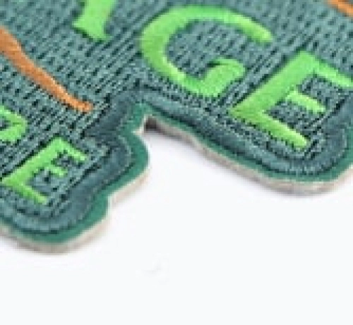 Custom patch with green embroidered border