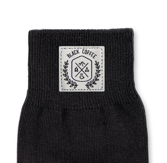 Custom jacquard knit socks with sewn on label