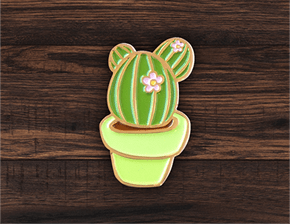 Cactus pin created with little pink flower