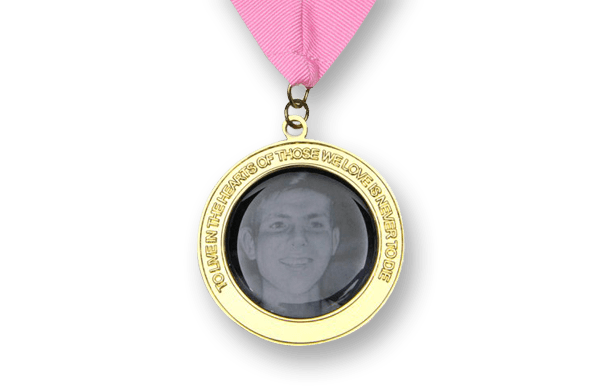 Custom personalized medal on pink ribbon