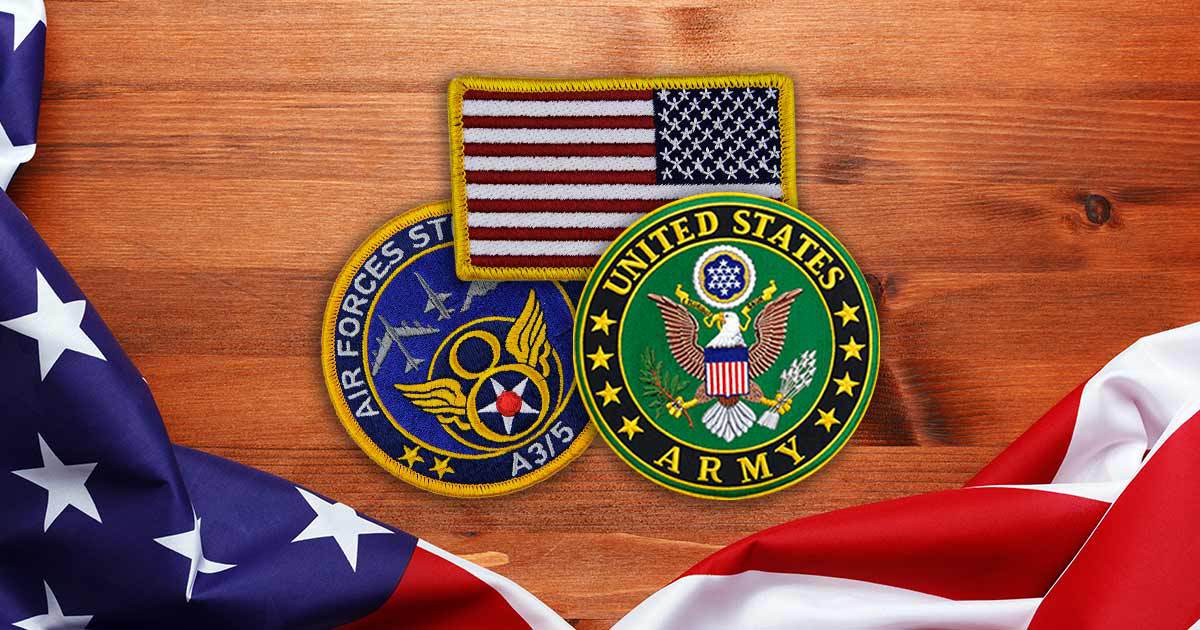 custom embroidered military patches on wood background