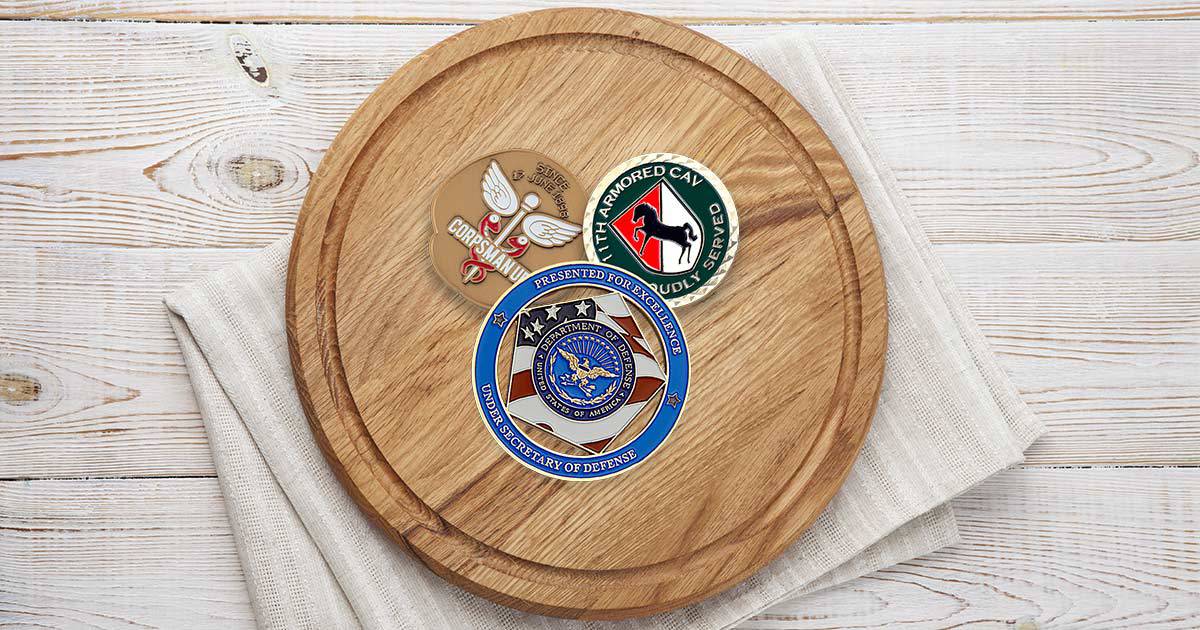 custom coins on a wooden round background